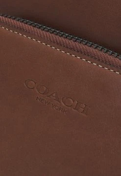 Buy ???? Coach GOTHAM PACK IN UNISEX - Across Body Bag - Dark Saddle ???? -Coach Shop 029fef12f48a4de7ab40b08942d8531d
