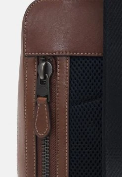 Buy ???? Coach GOTHAM PACK IN UNISEX - Across Body Bag - Dark Saddle ???? -Coach Shop 3afc96ce304948689637128cfadc7517