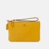 Hot Sale ???? Coach POLISHED SMALL WRISTLET - Clutch - Buttercup ????