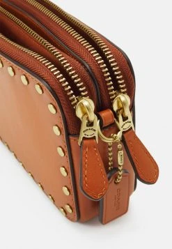 Deals ???? Coach SMOOTH WITH RIVETS KIRA CROSSBODY - Across Body Bag - Canyon ???? -Coach Shop e6e141564c4f464db543240c1cdc479c